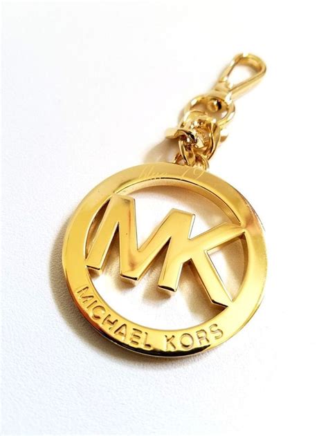 michael kors bar hang tag gold|MICHAEL KORS Burgundy Leather Gold MK Logo Bag Charm .